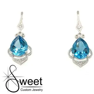 14KT WHITE GOLD BLUE TOPAZ AND DIAMOND EARRINGS