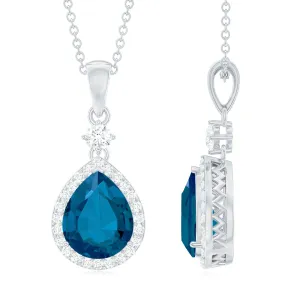 4.25 CT London Blue Topaz and Moissanite Halo Pendant Necklace in Silver