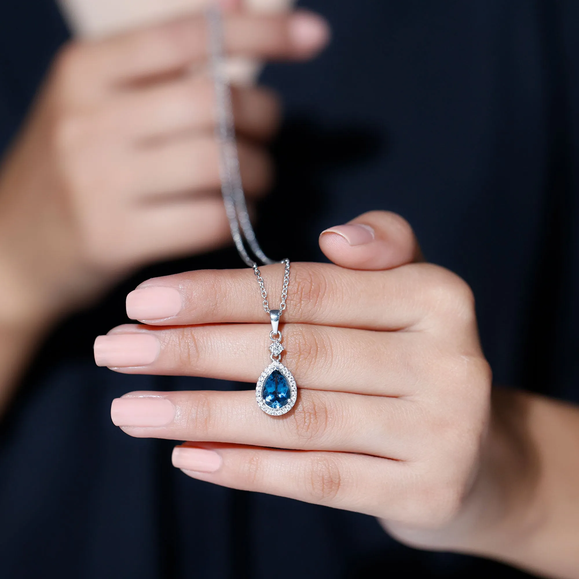 4.25 CT London Blue Topaz and Moissanite Halo Pendant Necklace in Silver