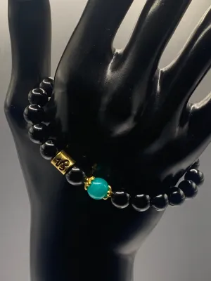 Capricorn Zodiac black obsidian with aquamarine chalcedony elastic beaded bracelet with gold accents