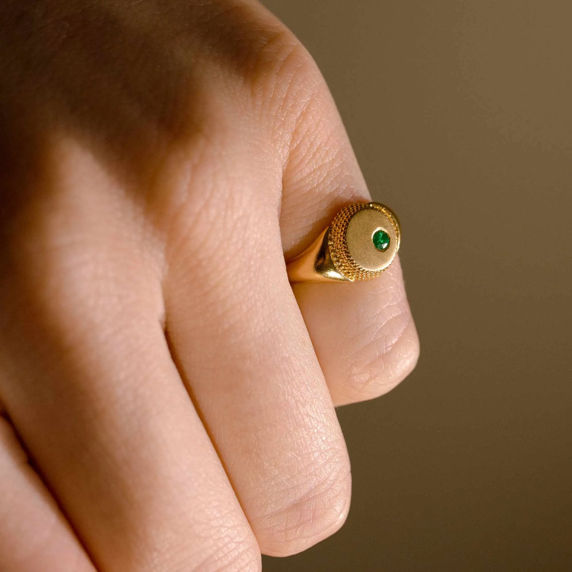 Emerald Paragon Signet Ring