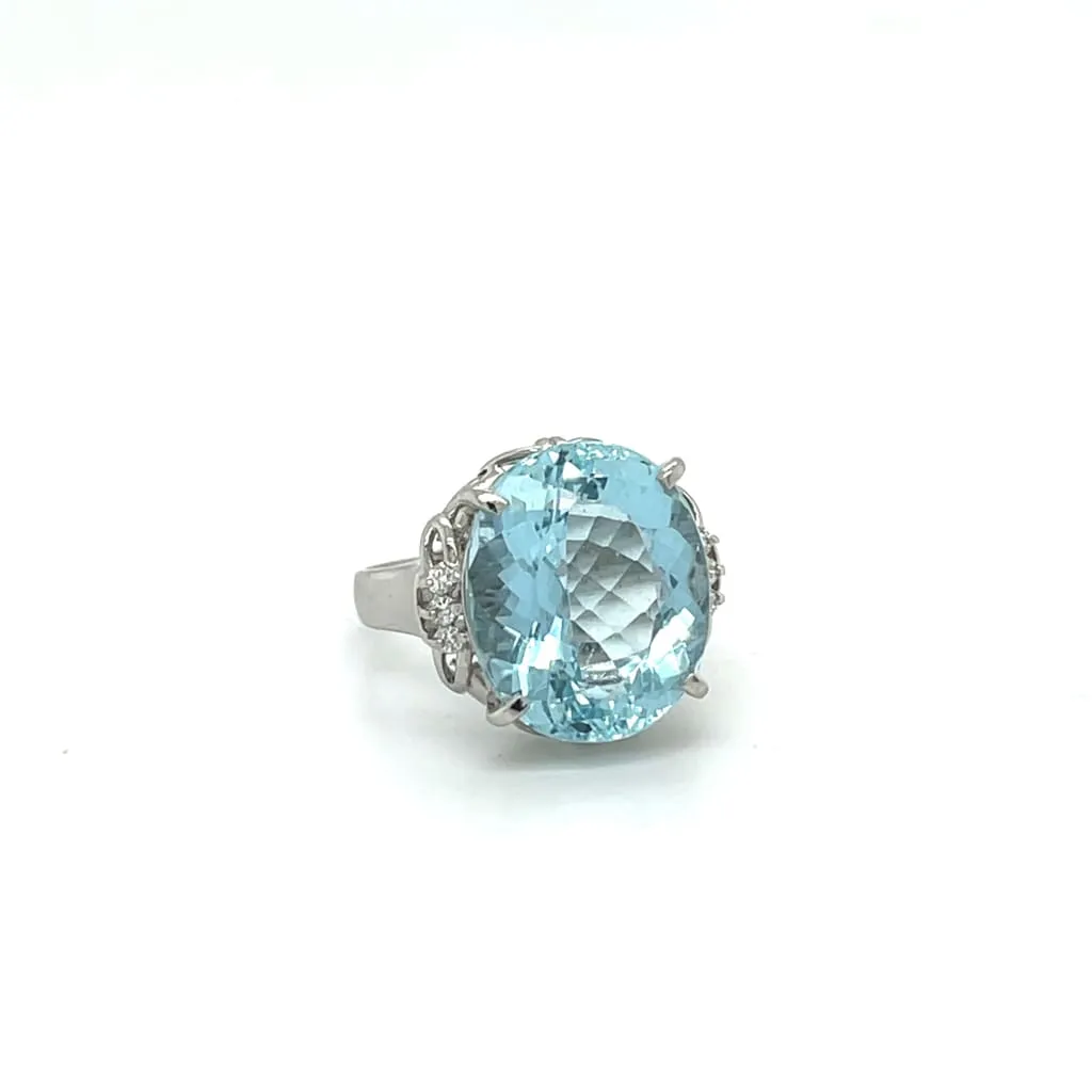 Estate Platinum Oval Aquamarine and Diamond Ring at Regard Jewelry in Austin, Texas