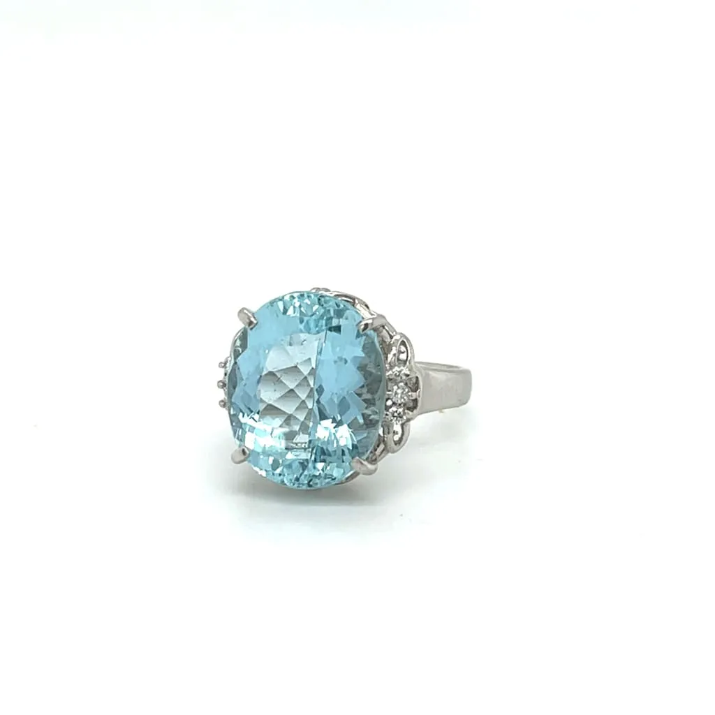 Estate Platinum Oval Aquamarine and Diamond Ring at Regard Jewelry in Austin, Texas