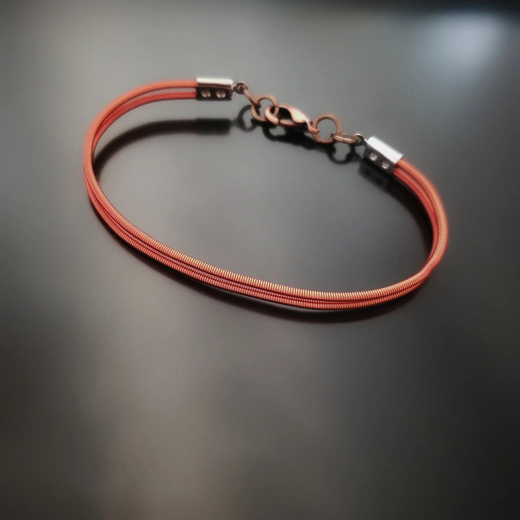 Orange Harp String Clasp Style Bracelet