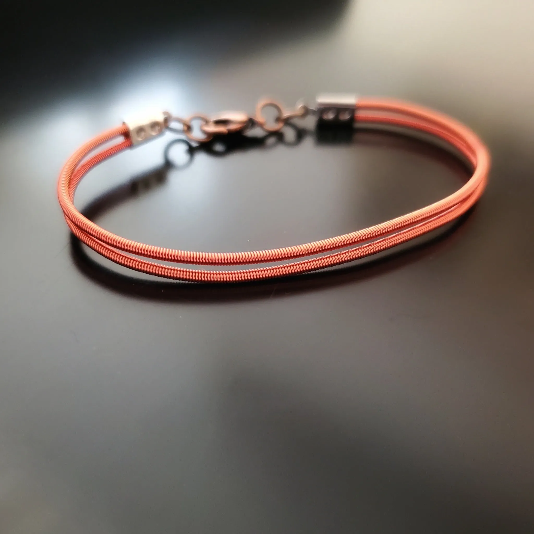 Orange Harp String Clasp Style Bracelet