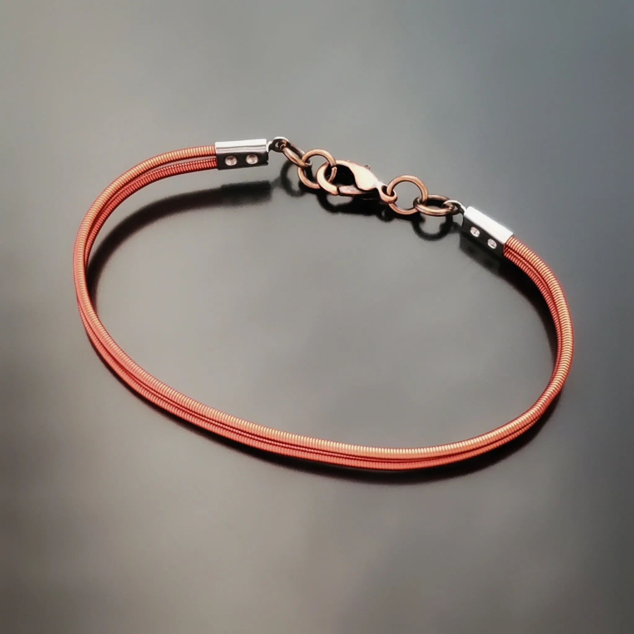 Orange Harp String Clasp Style Bracelet