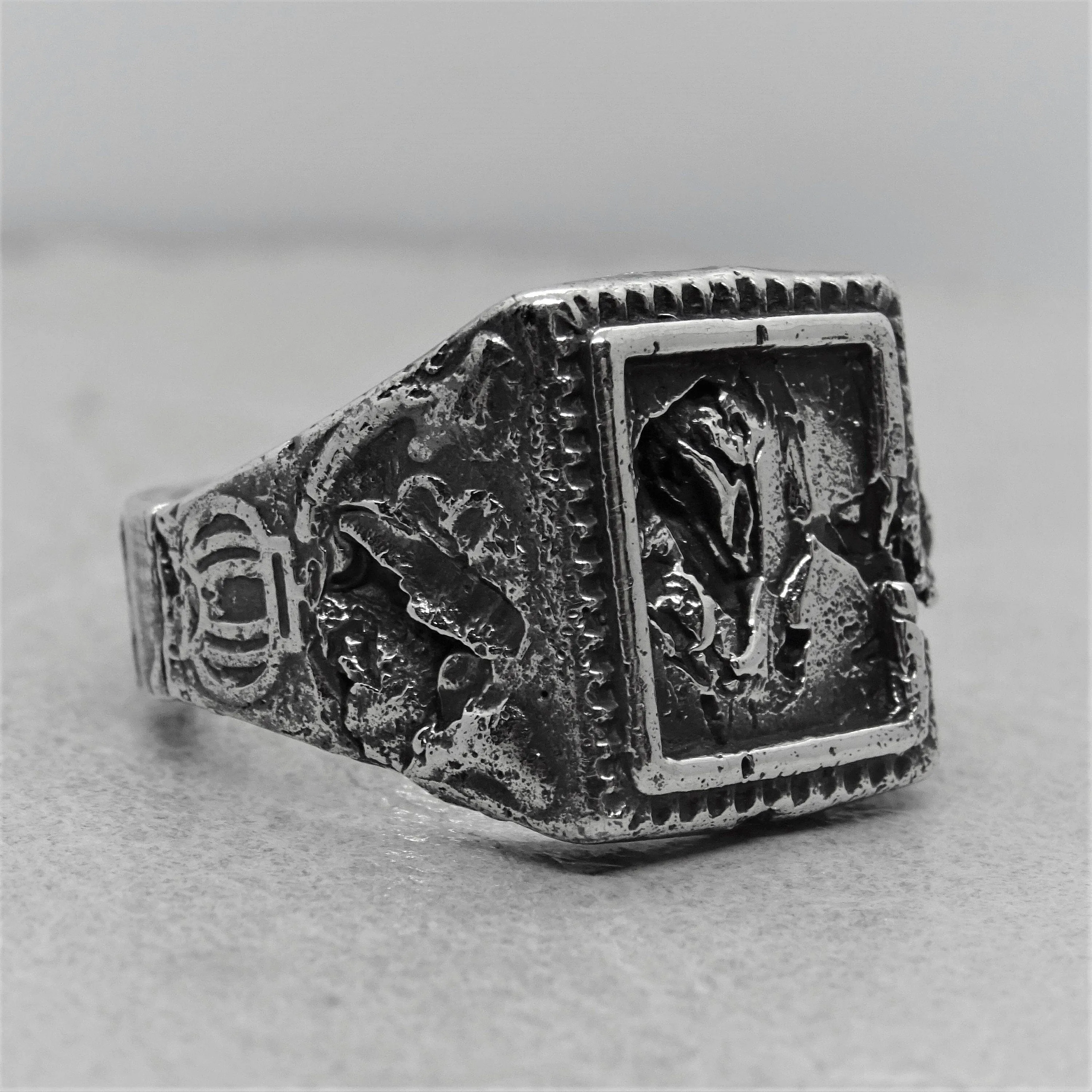 Svaneti ring - an unusual signet ring of a square shape with destroyed ethnic patterns