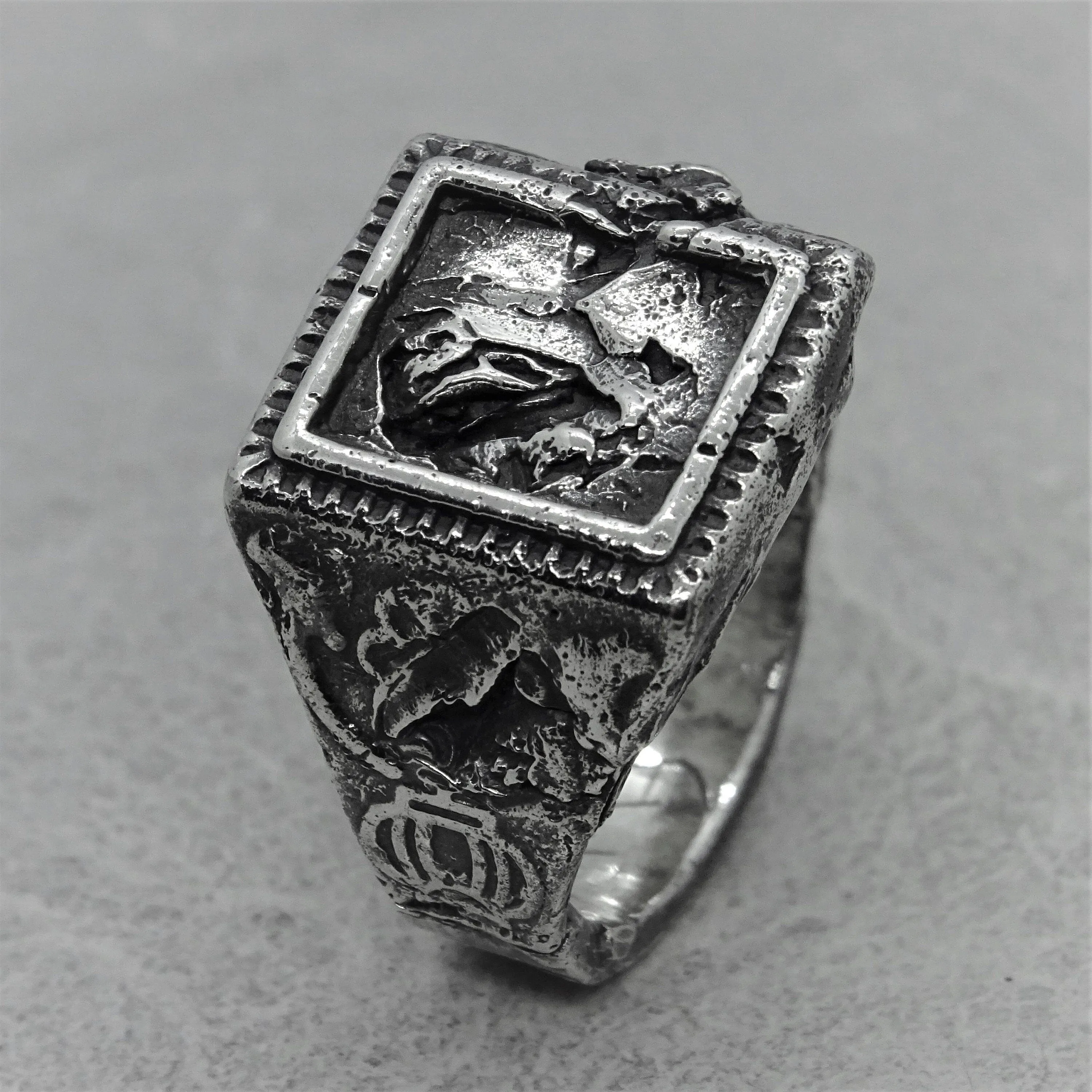 Svaneti ring - an unusual signet ring of a square shape with destroyed ethnic patterns