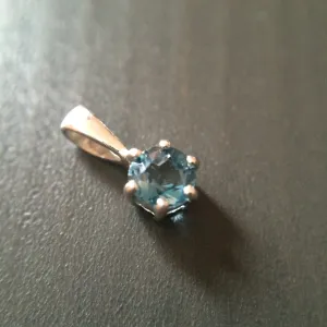 Tiny Blue Topaz Pendant - Prong set